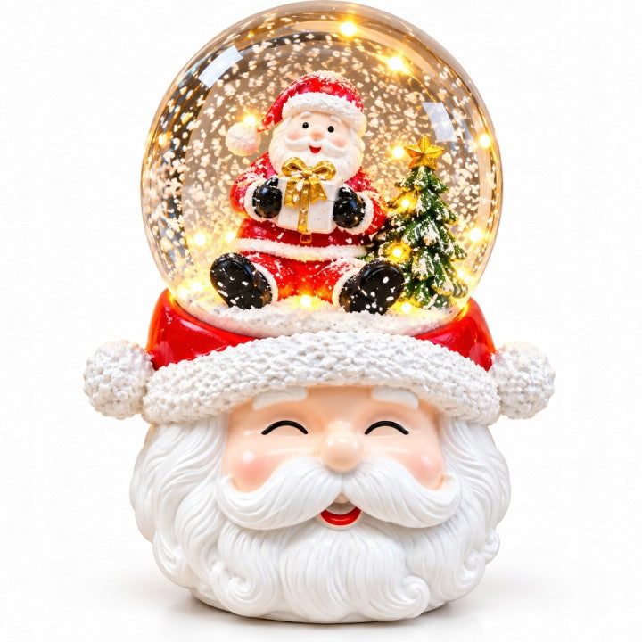 Kula śnieżna Mikołaj 16 cm LED z muzyką i wirującym śniegiem